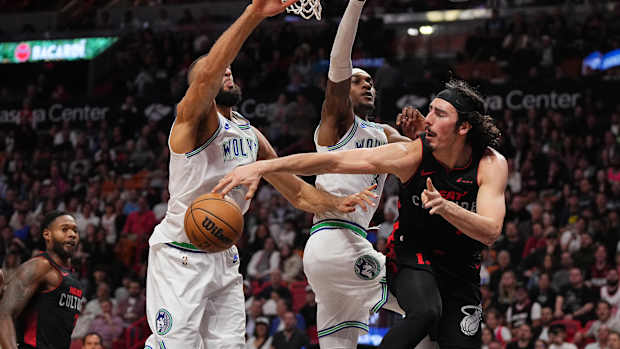 Jamie Jaquez Jr. tries to pass around Wolves